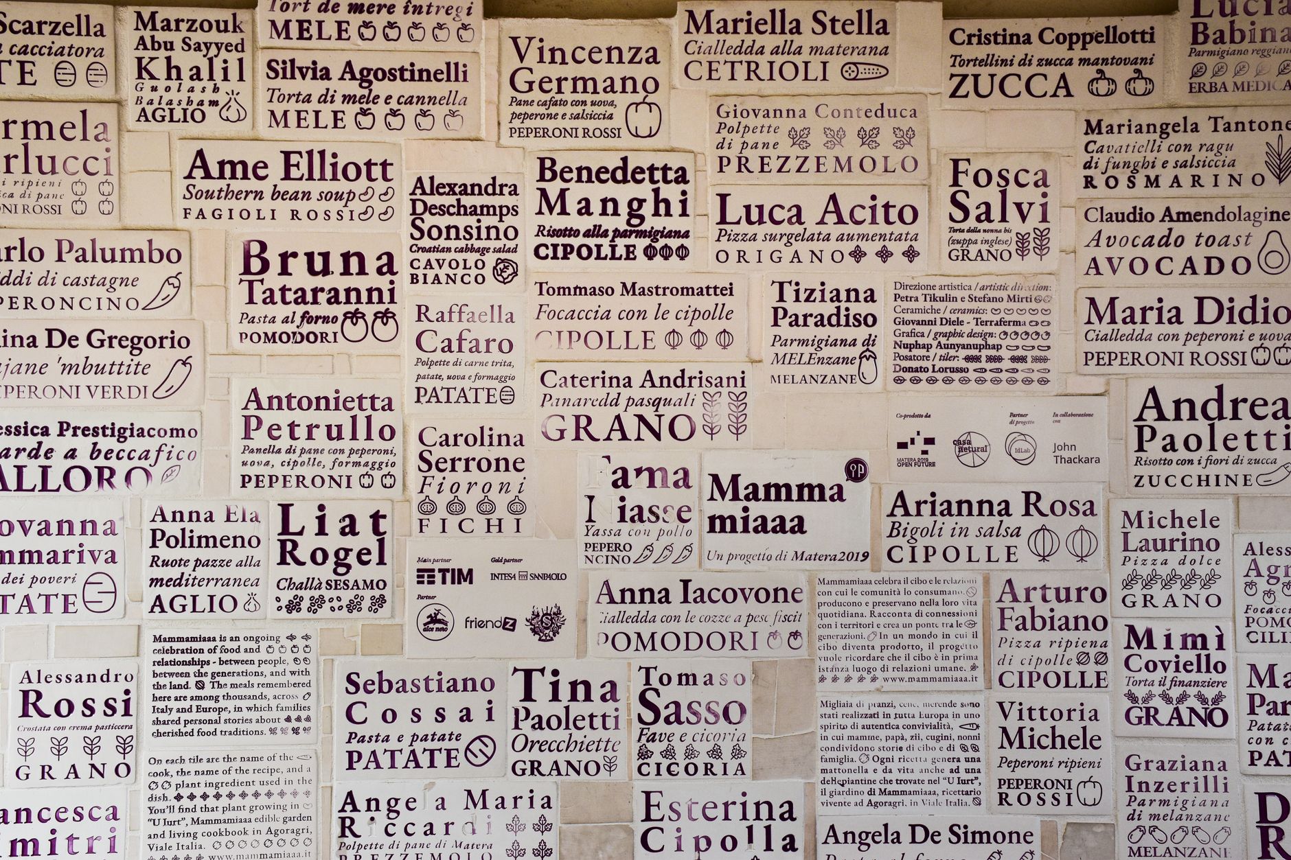 Wall of artisan tiles showcasing local names and recipes in Matera, Apulia. — The Impact of Artificial Intelligence on Casino